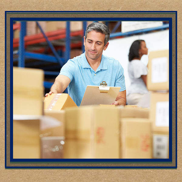 man checking packages