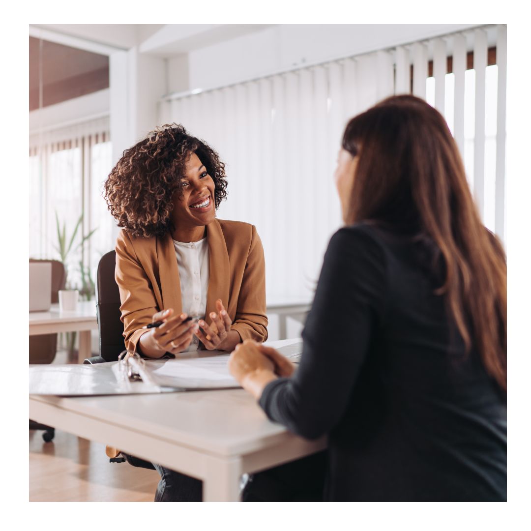 A woman meeting with a consultant